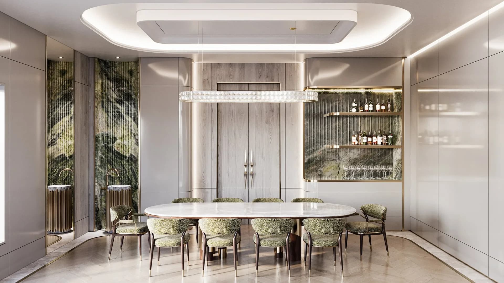 Oval pale dining table with green upholstered chairs, veined green wall panels and an elongated pendant light.